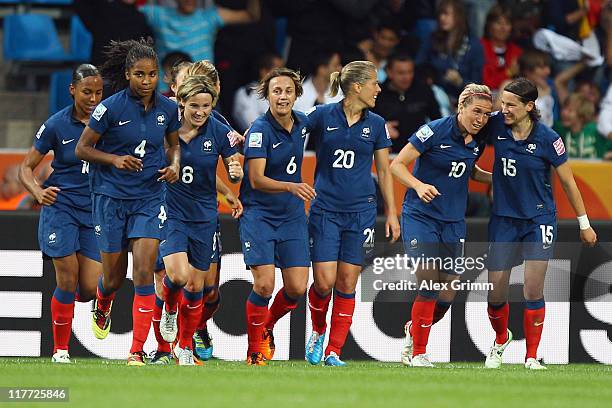 Camille Abily of France celebrates her team's third goal with team mates during the FIFA Women's World Cup 2011 Group A match between Canada and...