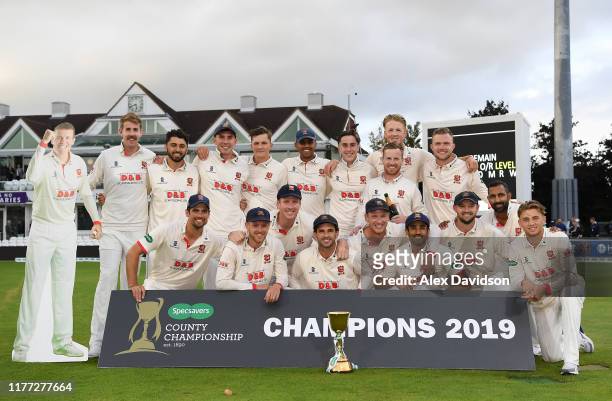 Essex pose with the Specsavers County Championship Division One Trophy during Day Four of the Specsavers County Championship Division One match...