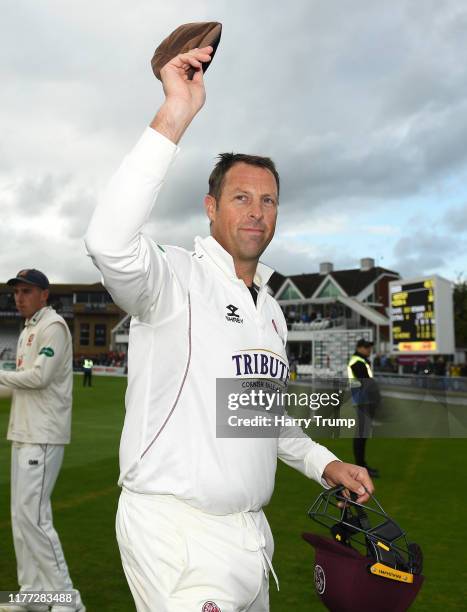 Marcus Trescothick of Somerset raises his cap to the crowd as he is given a guard of honour on his final match before retiring during Day Four of the...