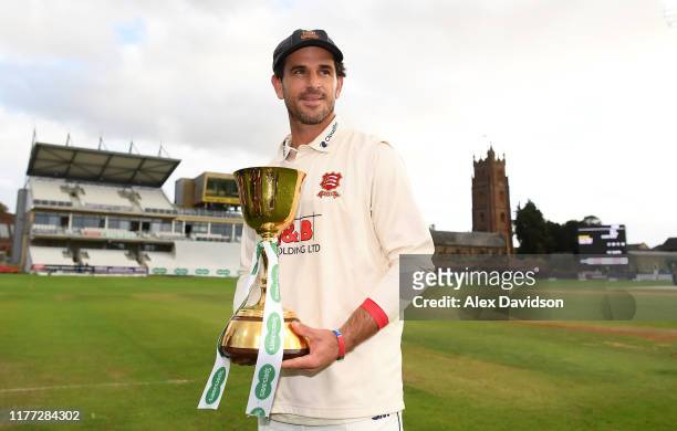 Ryan Ten Doeschate of Essex with the Specsavers County Championship Division One Championship Trophy during Day Four of the Specsavers County...