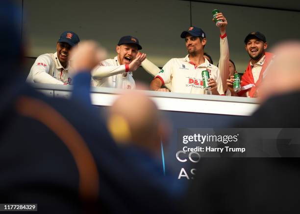 The Essex side celebrate on the balcony after winning the County Championship during Day Four of the Specsavers County Championship Division One...