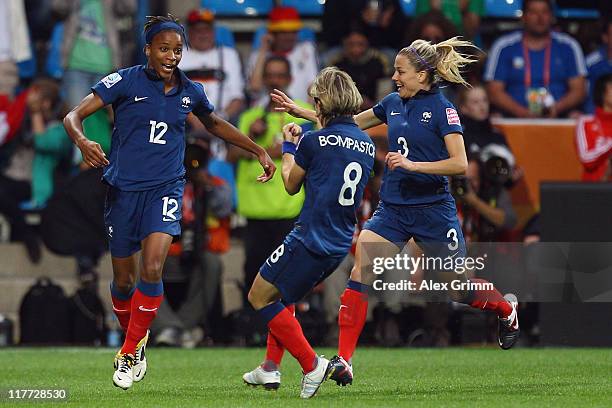 Elodie Thomis of France celebrates her team's fourth goal with team mates Sonia Bompastor and Laure Boulleau during the FIFA Women's World Cup 2011...