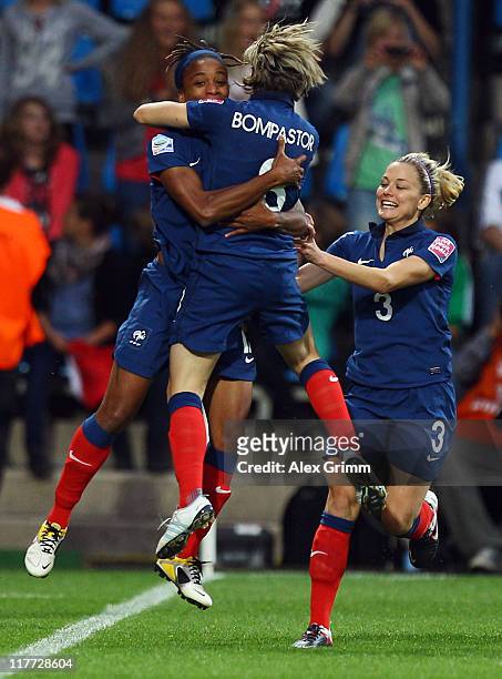 Elodie Thomis of France celebrates her team's fourth goal with team mates Sonia Bompastor and Laure Boulleau during the FIFA Women's World Cup 2011...