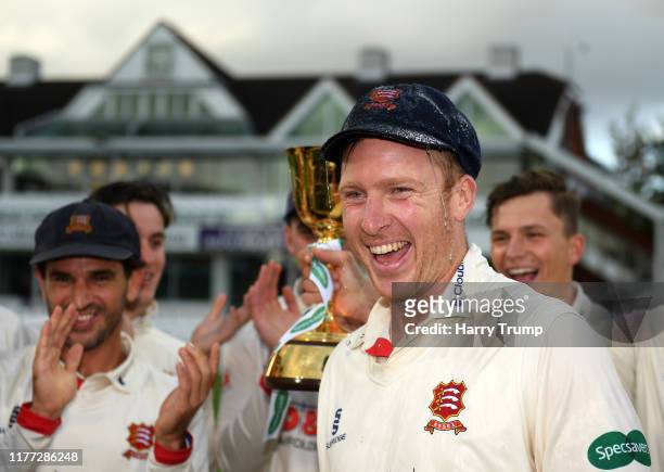 Simon Harmer of Essex celebrates after winning the County Championship during Day Four of the Specsavers County Championship Division One match...