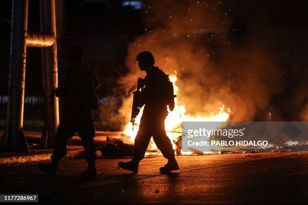 Soldiers patrol the streets of Concepcion, Chile, on October 20 during protests. Fresh clashes broke out in Chile's capital Santiago on Sunday after...