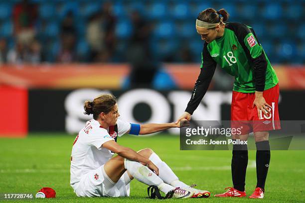 Christine Sinclair and Erin McLeod of Canada is seen after the FIFA Women's World Cup 2011 Group A match between Canada and France at Rewirpower...