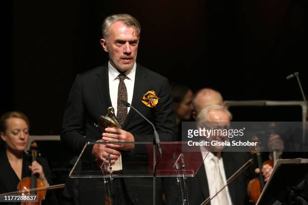 Neo Rauch with award during the European Cultural Award 'Taurus' at Vienna State Opera on October 20, 2019 in Vienna, Austria.