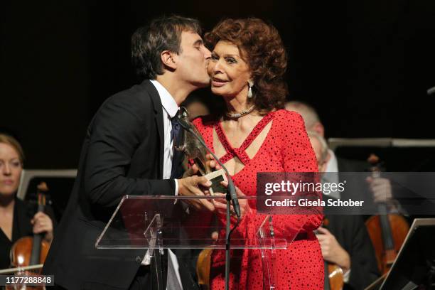 Carlo Ponti Jr. And his mother Sophia Loren during the European Cultural Award 'Taurus' at Vienna State Opera on October 20, 2019 in Vienna, Austria.