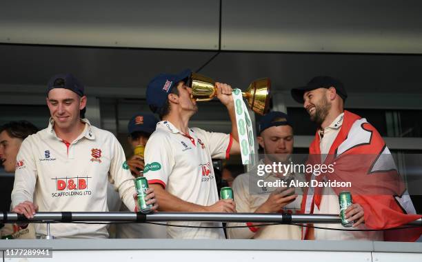 Sir Alastair Cook of Essex celebrates with the County Championship Trophy during Day Four of the Specsavers County Championship Division One match...