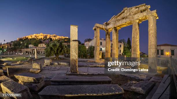 athena archegetis gate, on the former site of the roman forum in athens, greece. - agora stock pictures, royalty-free photos & images