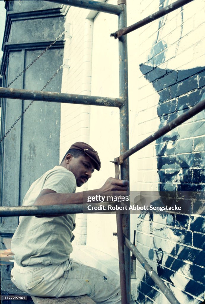 Norman Parish Works On The Wall Of Respect