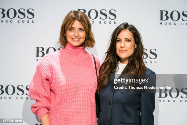 Model Eva Padberg and actress Bettina Zimmermann attend the HUGO BOSS Outlet opening at Outlet-City on September 26, 2019 in Metzingen, Germany.