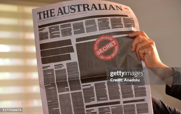 Front page of The Australian newspaper is seen on October 21, 2019 in Melbourne, Australia. Front page of every newspaper across Australia was...