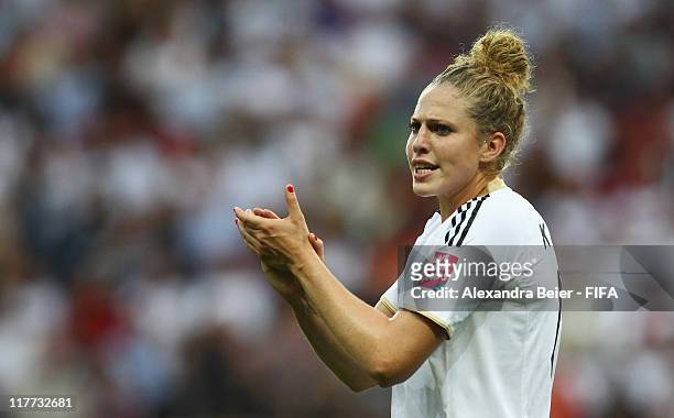 Kim Kulig of Germany reacts during the FIFA Women's World Cup 2011 Group A match between Germany and Nigeria at the FIFA World Cup Stadium Frankfurt...
