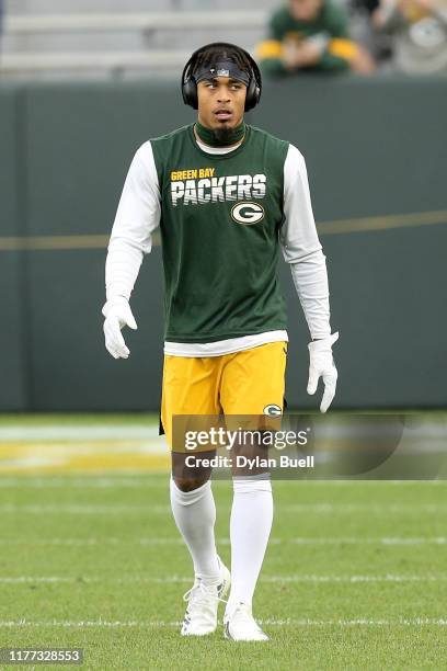 Jaire Alexander of the Green Bay Packers warms up before the game against the Philadelphia Eagles at Lambeau Field on September 26, 2019 in Green...