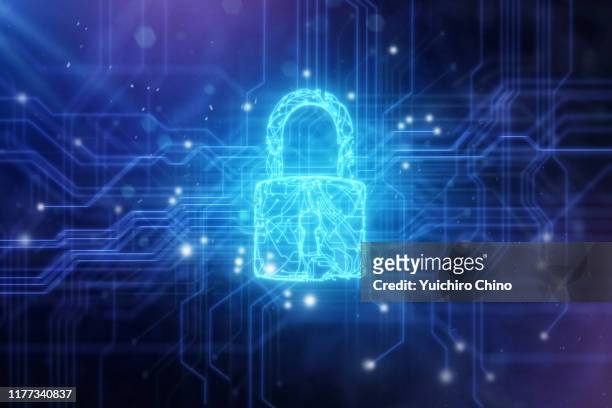 security padlock in circuit board - equipamento de segurança imagens e fotografias de stock