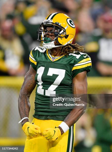 Davante Adams of the Green Bay Packers reacts after his first down in the first inning against the Philadelphia Eagles at Lambeau Field on September...