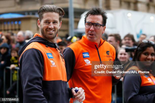 Callan Ward of the Giants and Giants general manager Wayne Campbell are seen during the 2019 AFL Grand Final Parade on September 27, 2019 in...