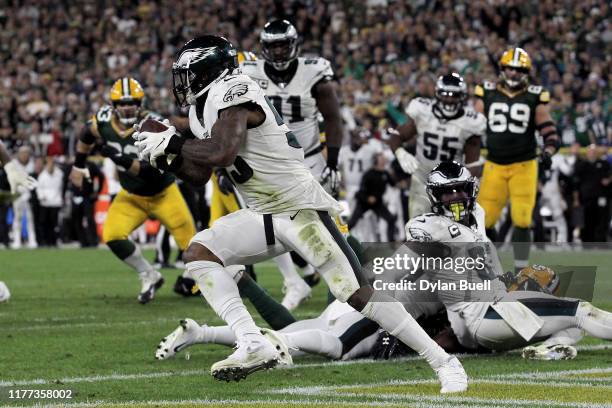 Nigel Bradham of the Philadelphia Eagles runs with the ball after making an interception in the fourth quarter against the Green Bay Packers at...