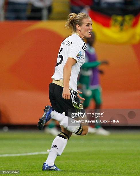 Simone Laudehr of Germany celebrates after scoring against Nigeria during the FIFA Women's World Cup 2011 Group A match between Germany and Nigeria...