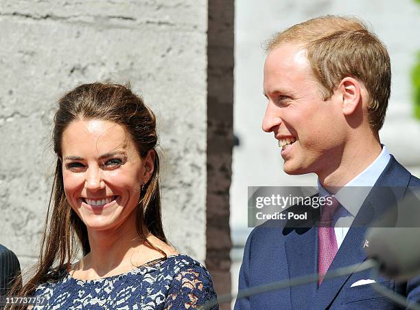 Prince William, Duke of Cambridge and Catherine, Duchess of Cambridge stand outside the official residence of the Governor General of Canada in...