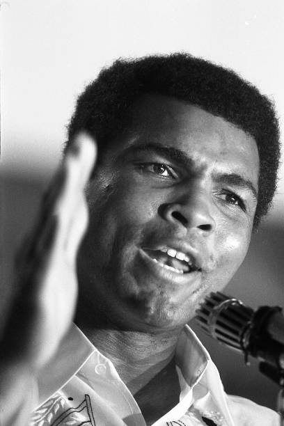 Champion heavyweight boxer Muhammad Ali addresses fans and supporters during press conference during training session in Manila, Philippines, prior...