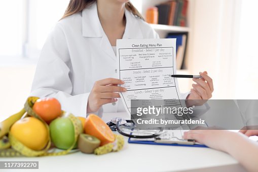 Nutritionist showing nutrition plan