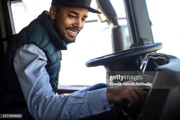 truck driver listening to radio - car stereo stock pictures, royalty-free photos & images