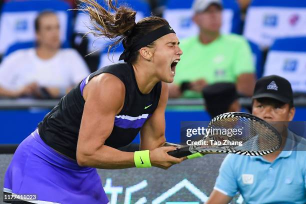 Aryna Sabalenka of Belarus celebrates after winning the Ladies' Singles semifinal against Ashleigh Barty of Australia on Day 6 of 2019 Dongfeng Motor...