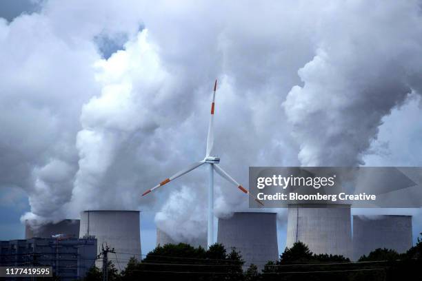 vapour from a lignite power plant - smog stock-fotos und bilder