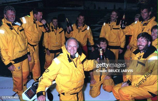 American adventurer Steve Fossett celebrates with his crew after docking in Auckland, 29th March 1999, following their record breaking 24 hour, 580...