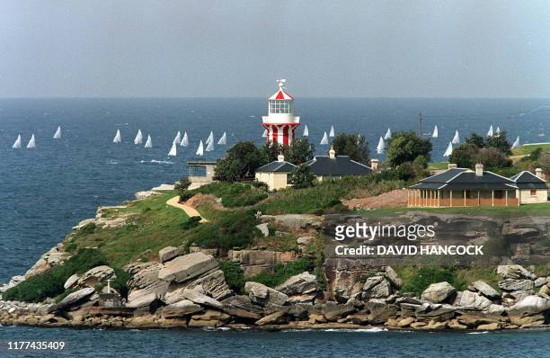 Olympic 470 yachts work to windward on an off-shore course adjacent to South Head during the Sydney Harbour Regatta, 23 September 1999. The arrival...