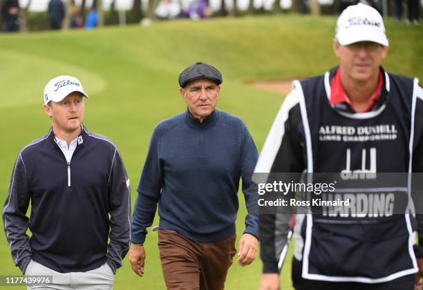 Justin Harding of South Africa and Vinnie Jones during Day two of the Alfred Dunhill Links Championship at Kingsbarns Golf Links on September 27,...