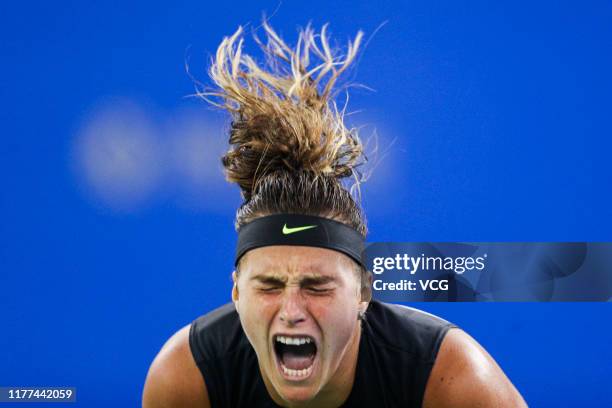 Aryna Sabalenka of Belarus celebrates victory after the semi-final match against Ashleigh Barty of Australia on Day six of 2019 Dongfeng Motor Wuhan...