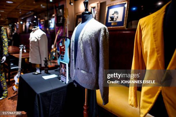 Kurt Cobain's cardigans from Nirvana's 1993 MTV Unplugged performance is on display at the Hard Rock Cafe in New York City ahead of the auction of...