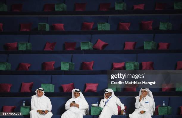 Spectators wearing thobes attend day one of 17th IAAF World Athletics Championships Doha 2019 at Khalifa International Stadium on September 27, 2019...
