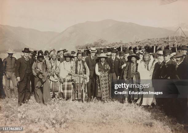 Large Group of Salish American Indians gathered with Secretary of the Interior, James Rudolph Garfield, Flathead Indian Reservation, Montana, USA,...