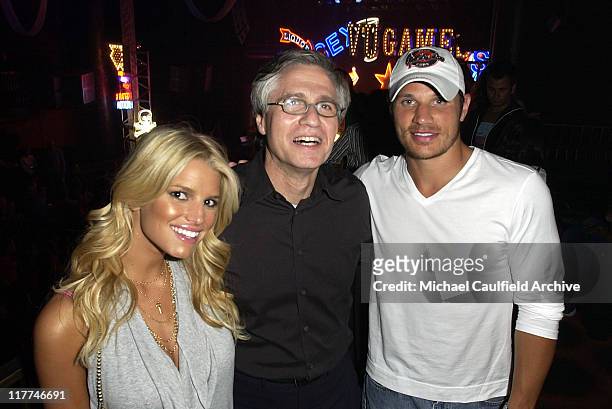 Jessica Simpson, Bruce Hack, CEO of Vivendi Universal Games and Nick Lachey