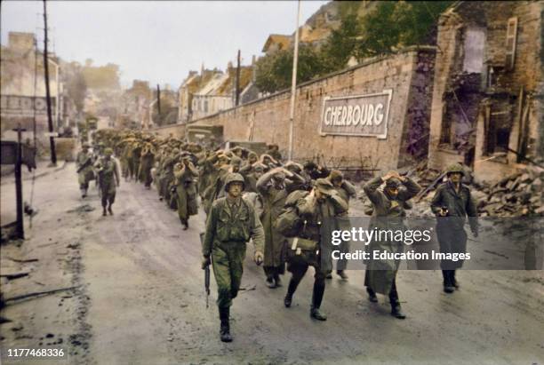 Troops Marching German Prisoners in Street, Battle of Cherbourg, Cherbourg, France, June 1944.