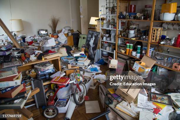 Messy room in hoarders home.