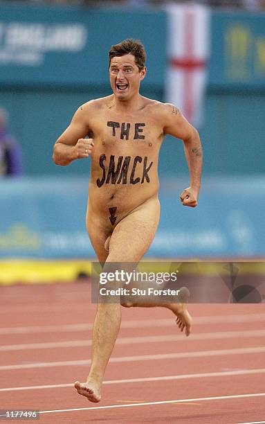 Streaker runs down the track at City of Manchester Stadium during the 2002 Commonwealth Games, Manchester, England on July 27, 2002.