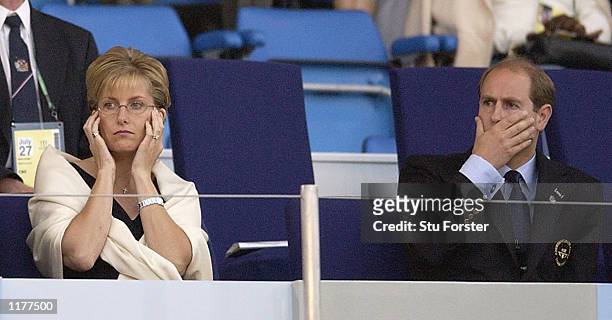 The Earl and Countess of Wessex react as a streaker runs down the track at City of Manchester Stadium during the 2002 Commonwealth Games, Manchester,...