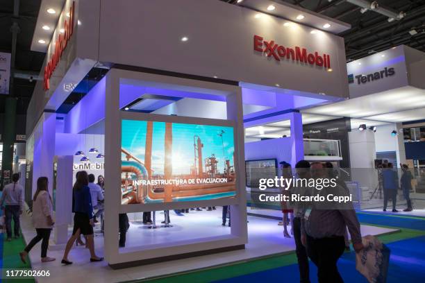 Trade fair visitors lookup information in ExxonMobil company booth during the XII Argentina Oil and Gas Expo 2019 at La Rural on September 26, 2019...