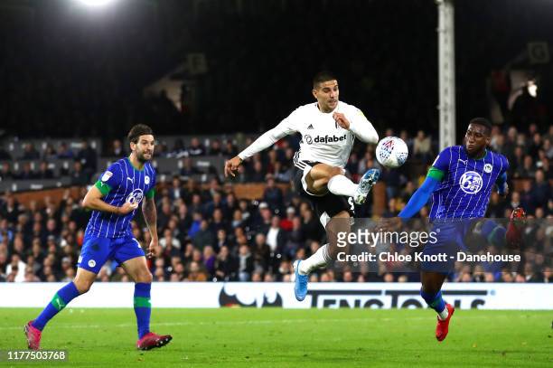 Aleksandar Mitrovic of Fulham FC takes a shot at the goal during the Sky Bet Championship match between Fulham and Wigan Athletic at Craven Cottage...