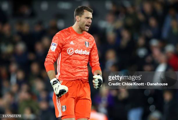 Marcus Bentinelli of Fulham FC celebrates his teams first goal during the Sky Bet Championship match between Fulham and Wigan Athletic at Craven...
