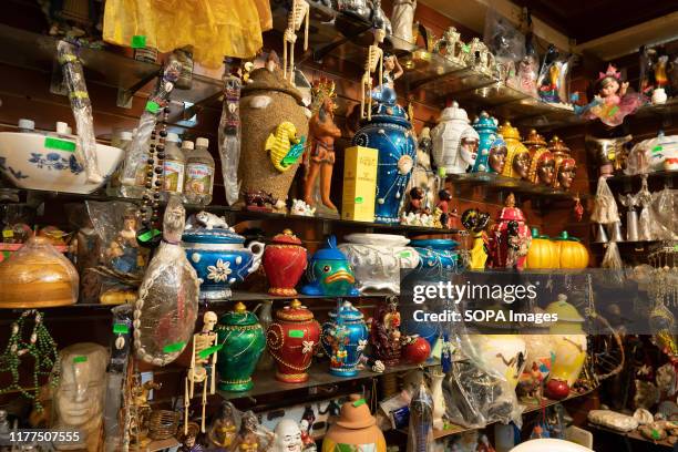 Items used in an alter are seen in a witchcraft shop in Mexico City. Day of the Dead objects from the markets in Mexico City. Typically these objects...