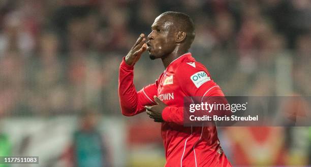 Anthony Ujah of 1.FC Union Berlin celebrates with team mates after scoring his team's first goal during the Bundesliga match between 1. FC Union...