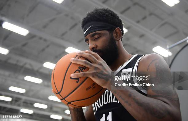 Kyrie Irving of the Brooklyn Nets poses for a photograph during Media Day at HSS Training Center on September 27, 2019 in the Brooklyn borough of New...