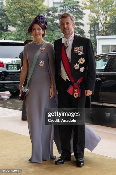 Crown Prince Frederik and Crown Princess Mary of Denmark arrive to attend the Enthronement Ceremony Of Emperor Naruhito of Japan at the Imperial...