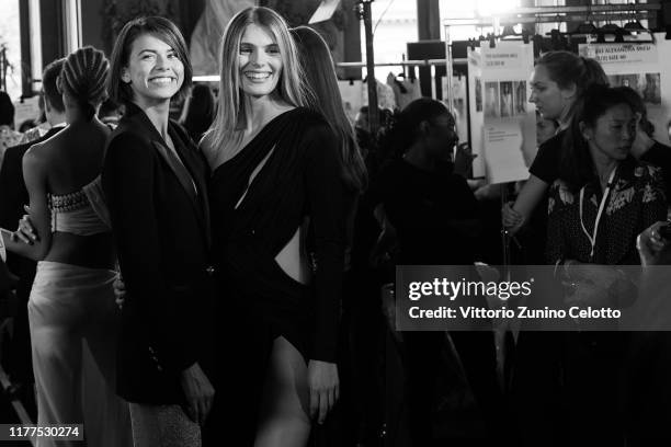 This image has been converted in black and white] A model poses backstage ahead of the Redemption Womenswear Spring/Summer 2020 show as part of Paris...